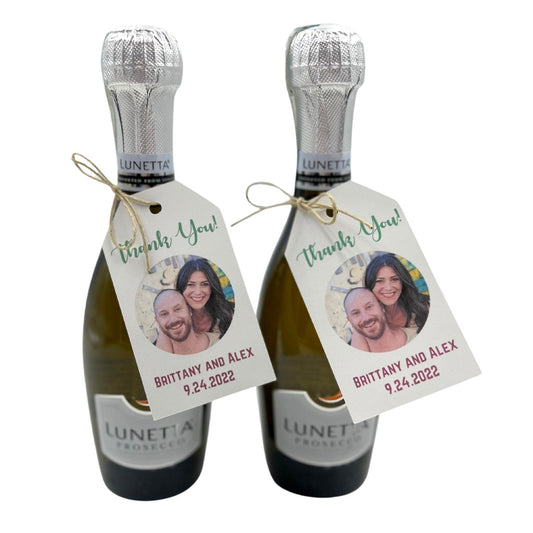 Personalized bridal shower favor tags on mini wine bottles