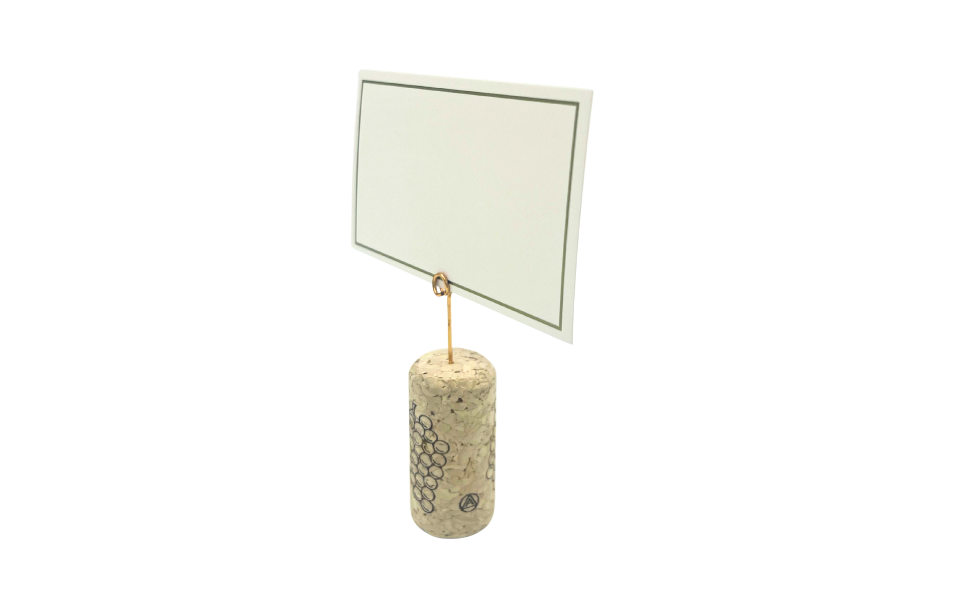 Close-up of white flat place card with metallic gold border for elegant table decor