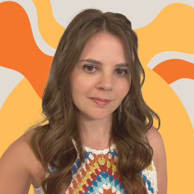 Nicole Goldmann, founder of Edie Rose Design, smiling in her studio