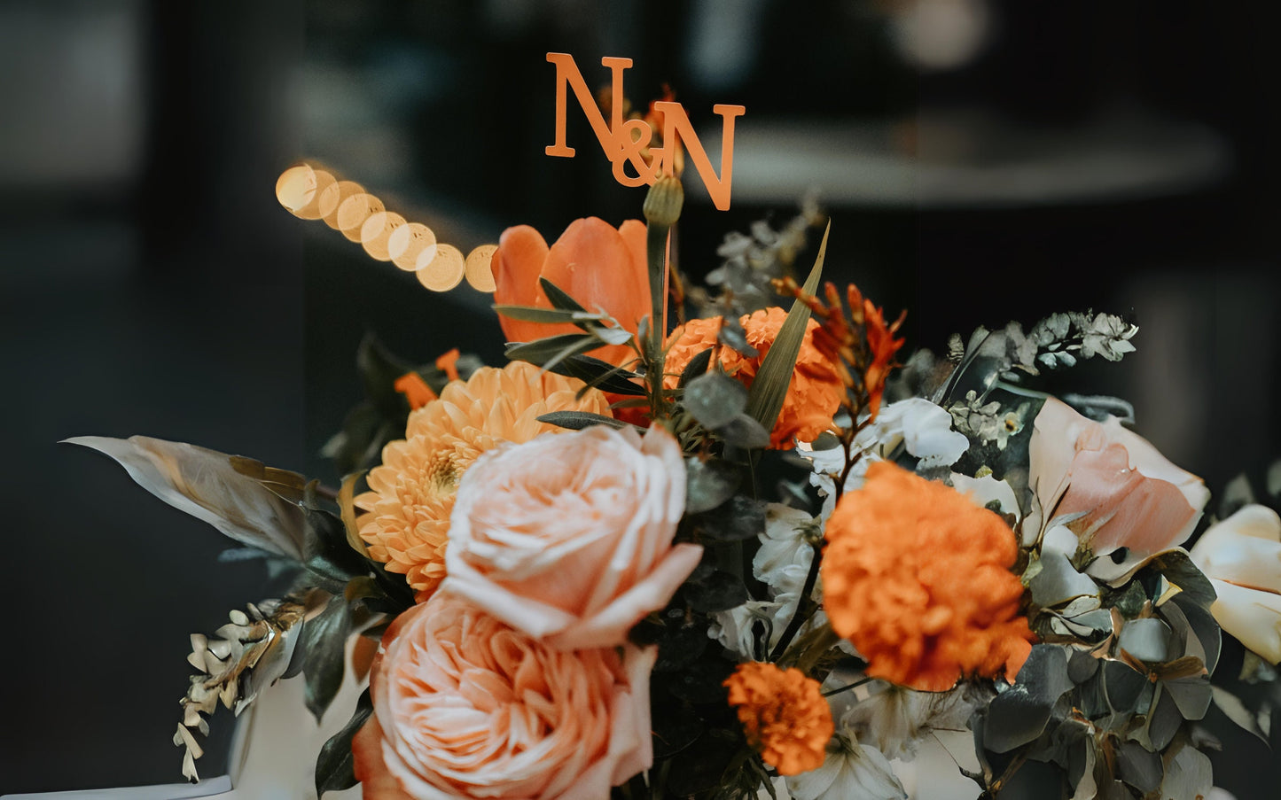 Wedding centerpiece with custom name sticks on clear rods